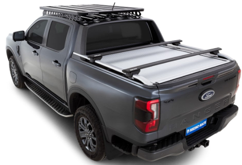 Ford ranger gris avec une galerie de toit et des barres rhinorack