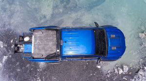 vue de dessus d'un pick up bleu avec un tiroir dans la benne