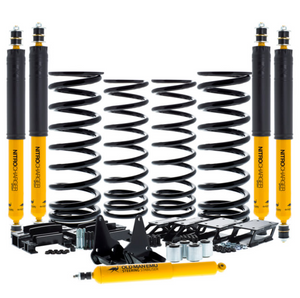 kit suspension noir et jaune OME complet étalé sur un fond blanc