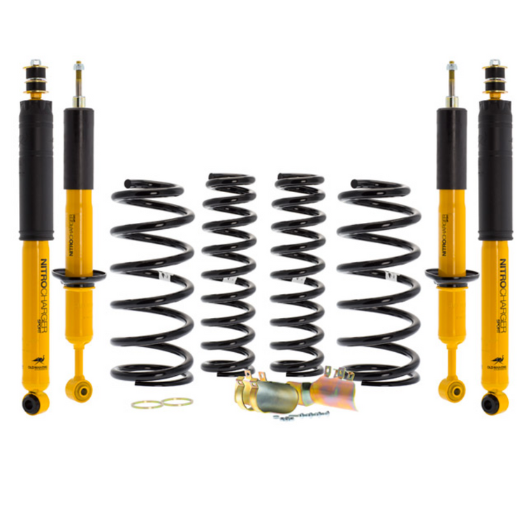 kit suspension noir et jaune avec des ressorts et des amortisseurs