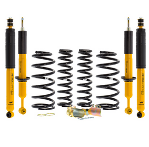 kit suspension ome jaune et noir avec 4 ressorts et 4 amortisseurs sur fond blanc